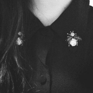Black silky shirt with bees details on the collar